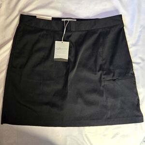 Greg Norman Black Golf Skort – Size 12, Adjustable Comfort Waist, Slash Pockets
